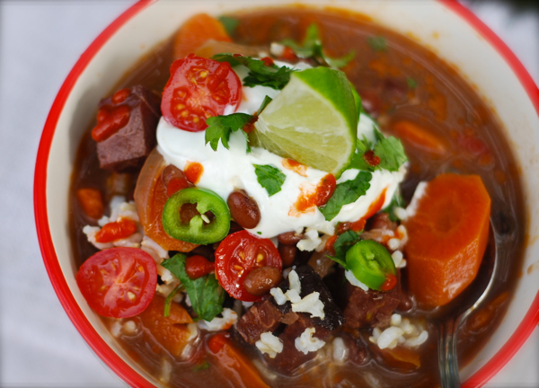 Savory Cuban soup with beans, vegetables, meat, and rice or bread.